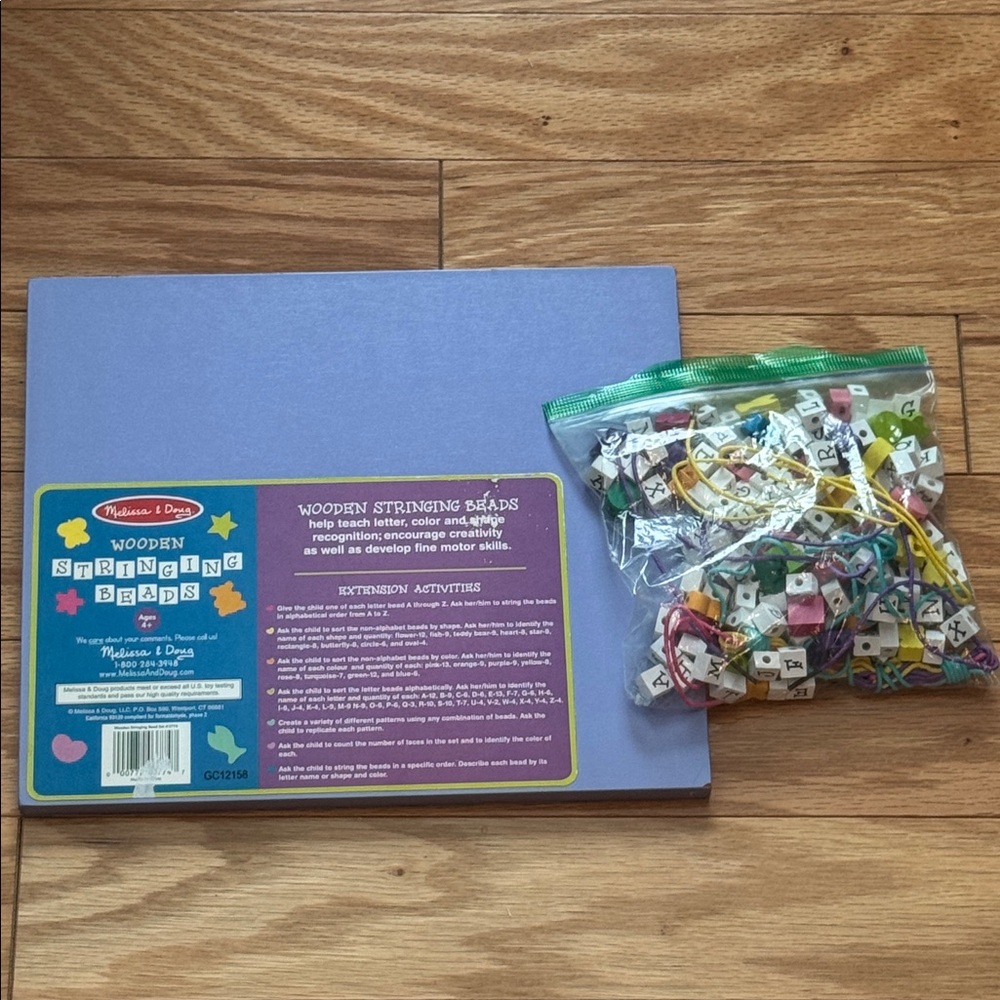 Melissa and Doug Wooden Stringing Beads with wooden bead holder tray and strings